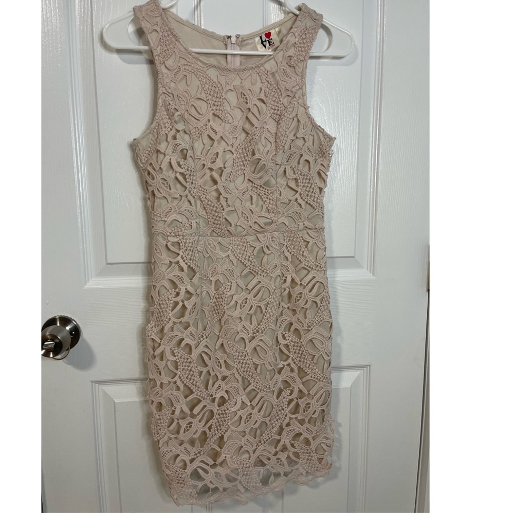 cream dress with elegant embroidery